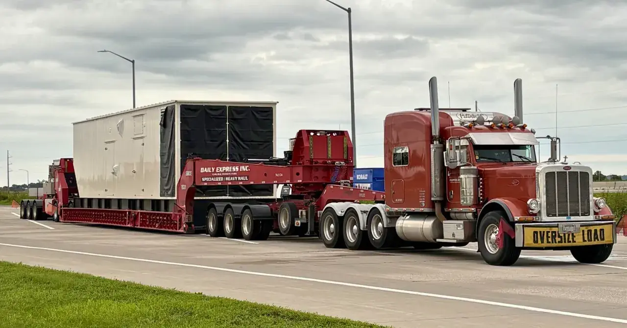 building moved by Daily Express driver shows heavy skilled transport